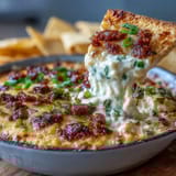 Creamy queso dip with spicy chorizo, fresh pico de gallo, and jalapeños served with crunchy tortilla chips.