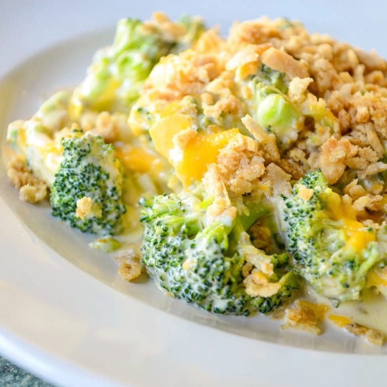 Creamy Broccoli Casserole, showcasing tender broccoli florets under a crisp, golden Ritz cracker crust.